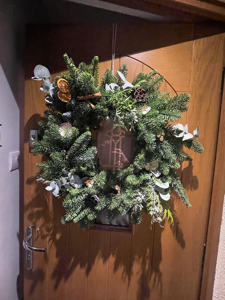 A Christmas wreath on a door